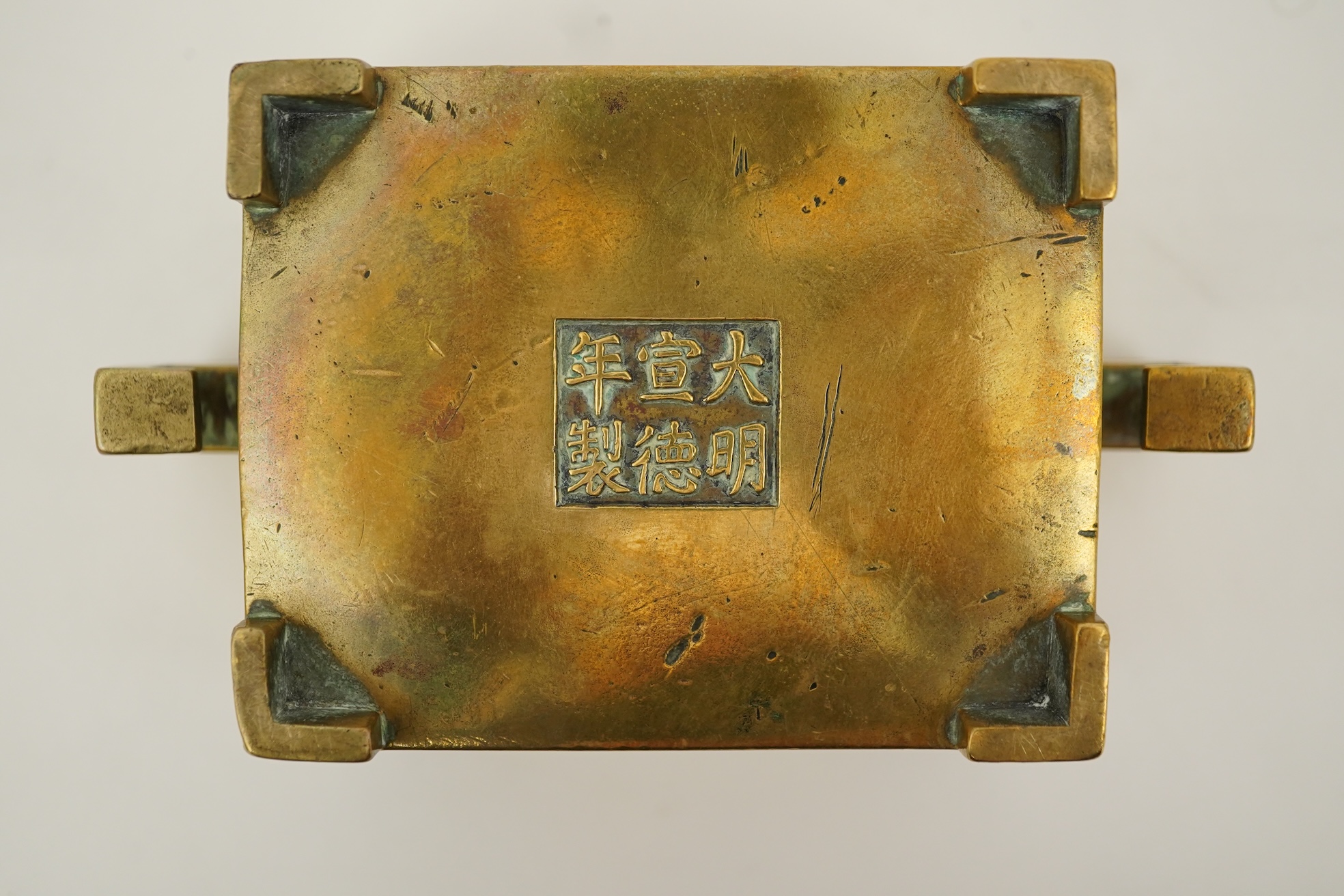 A Chinese bronze rectangular censer, fangding, Xuande mark, 18th century